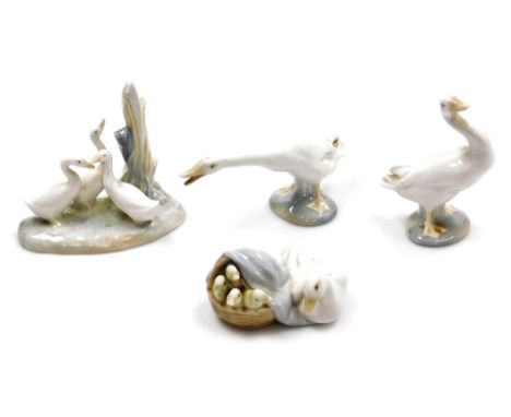 A group of Lladro, comprising two geese, 12cm and 7cm high, a duck and ducklings group, 10cm wide, together with a Nao porcel