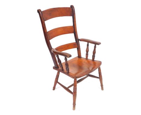 A Victorian beech ladder back kitchen chair, with a solid saddle seat, raised on ring turned legs, united by an H frame stret