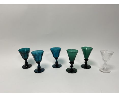 A pair of Edwardian green crystal sherry glasses with baluster stems and trumpet shape bowls (h. 13.3), together with three b