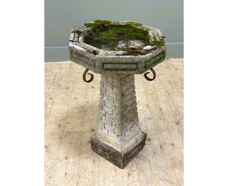 A composition octagonal vintage bird bath circa 1970 with mossy octagonal top on square tapered column and base (h.67cm x d. 
