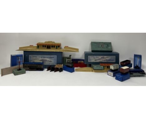 A collection of Hornby Dublo railway wagons, tracks, buildings etc comprising, a D1 Island Platform, a D1 Through Platform, a