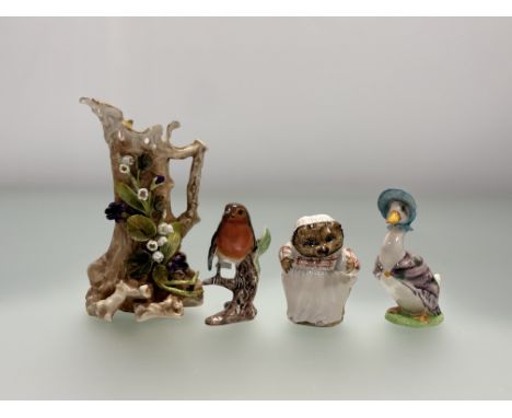 A collection of various figures comprising, two Beswick Beatrice Potter figures one of "Jemima Puddleduck" and the other "Mrs
