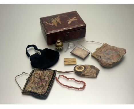 A Japanese red lacquered box containing, a vintage gilt metal mounted tapestry evening purse with chain strap: h. x 13cm, a 1