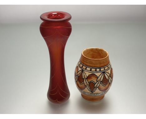 An Art Deco Charlotte Rhead "Lotus Leaves" vase, marked verso (h-18cm) together with a tall red art glass vase, with yellow a