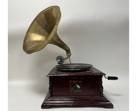 A wind-up Gramophone (later reproduction) stained wood case with large brass horn, bearing the name 'His Masters Voice', fitt