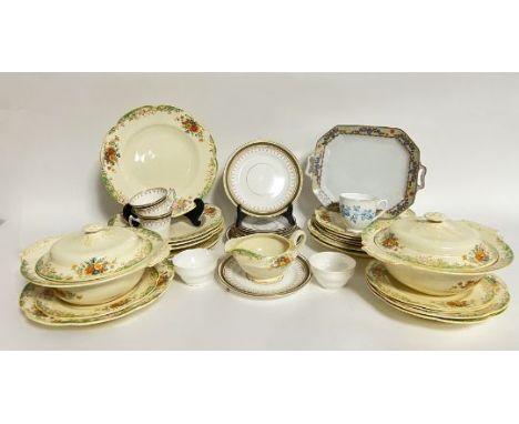 A mixed part foral tea/dinner service comprising, six soup bowls (d. 25cm), six smaller bowls (d. 22cm), two vegetable tureen