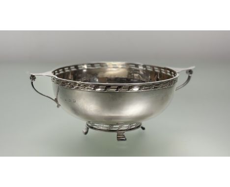An Edward VIII Birmingham silver bowl of quaich form by Albert Edward Jones in a combination of Art Deco and Arts and Crafts 