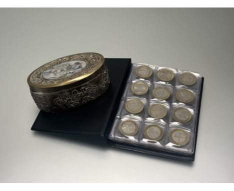 A folder containing a collection of fifty-six Queen Elizabeth II fifty pence, twenty Queen Elizabeth II two pound coins and a