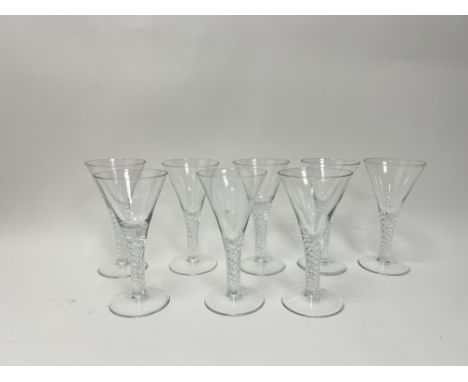 A set of eight tall wine glasses with spiral air twist stems and trumpet bowls (h. 22cm) (marked 'M' verso)