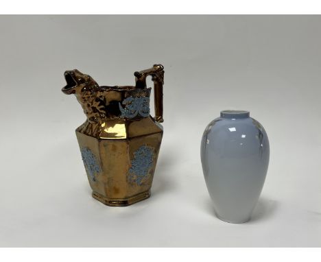 A copper lustre ware jug with floral motifs and a tiger head moulded to spout (h. 17cm), together with a Royal Copenhagen vas