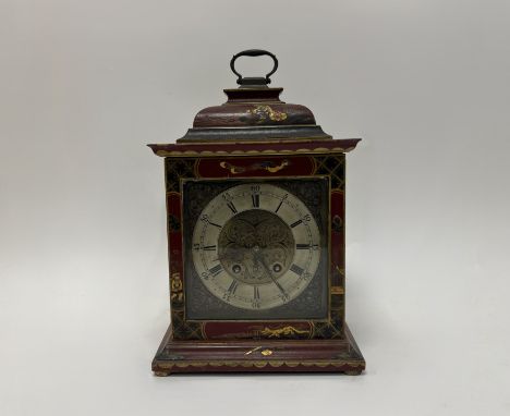 A Georgian style red Chinoiserie bracket clock with gilt lacquer in the oriental style with caddy bell top and brass carrying