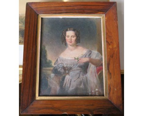 A 19th century oil on paper, portrait of a woman, 9ins x 7ins, in a rosewood frame