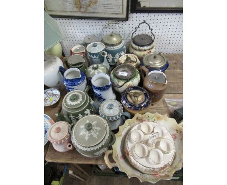 A collection of Carlton Ware biscuit barrels, tobacco jars, coffee pots etc