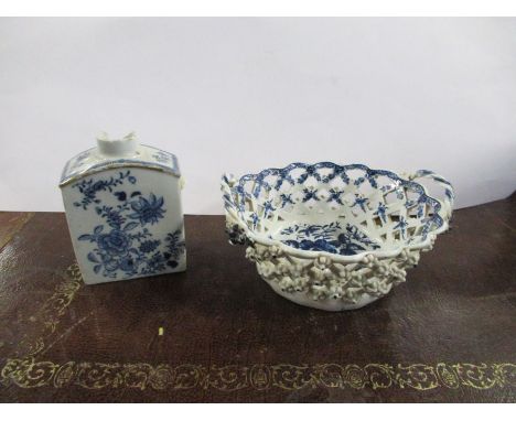 A 19th century English porcelain chestnut basket, decorated in blue and white, together with a Chinese porcelain tea caddy, d