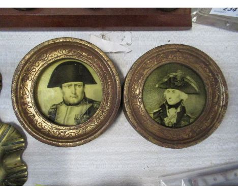 A pair of circular portrait miniatures of Nelson and Napoleon