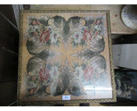 A 19th century bead work and tapestry panel of flowers and leaves, 17ins x 17ins