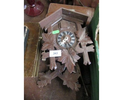 A wooden cased cuckoo clock