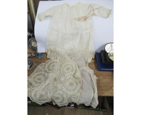 Two lace babies dresses and another lace item