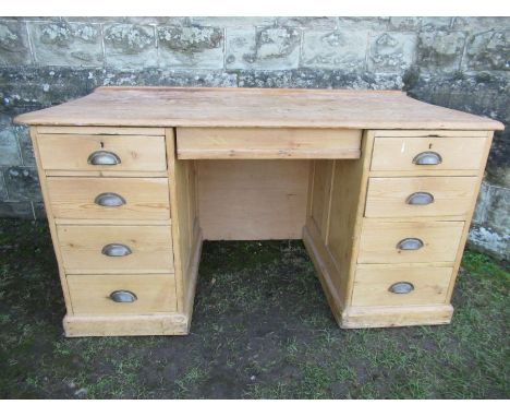 A GWR pine desk, the handles and base both stamped GWR&nbsp; , width 59ins,&nbsp; depth 31ins, height 31ins&nbsp;