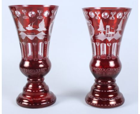 A pair of Continental ruby flashed and engraved wasted vases with landscape decoration, 12" high 