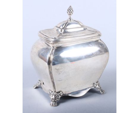 A George V silver tea caddy of rounded rectangular form, on lion paw feet, 4" wide, 6oz troy approx 