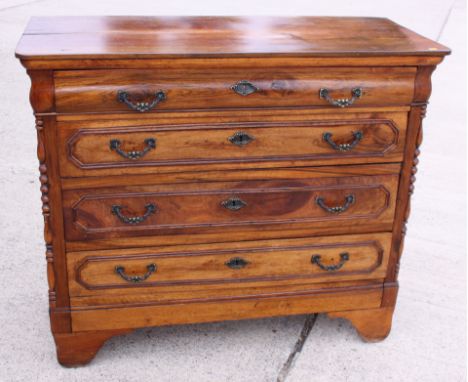 A Continental walnut chest of four long drawers, on bracket feet, 46" wide 