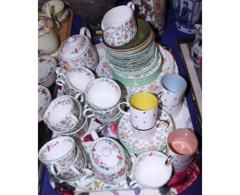 A Minton "Haddon Hall" porcelain tea service and a Susie Cooper porcelain coffee set, painted with gilt stars 