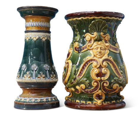TWO LATE 19TH CENTURY DOULTON LAMBETH STONEWARE JARDINIÈRE STANDS the first of waisted form, decorated with foliate bands, im