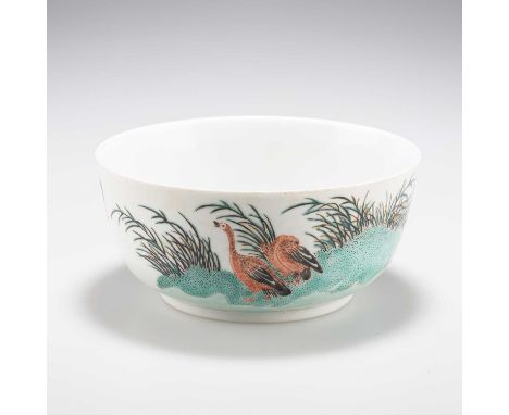 A CHINESE BOWL circular, enamel painted with geese on a riverbank, bears a puce painted mark. 15.5cm diameterIn good conditio