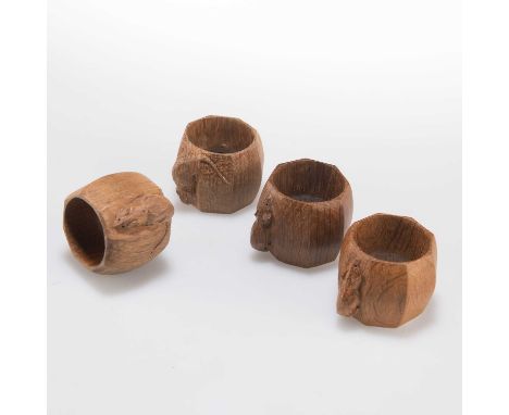 ROBERT THOMPSON OF KILBURN, A SET OF FOUR MOUSEMAN OAK NAPKIN RINGS octagonal, each with small carved mouse signature. (4) 4c