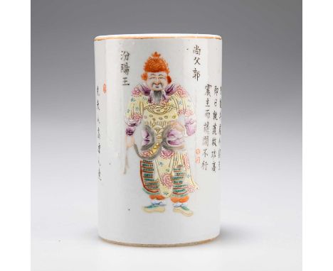 A CHINESE FAMILLE ROSE BRUSH POT, 19TH CENTURY cylindrical, enamel painted with two figures, bears an iron-red six-character 