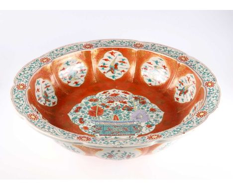 A CHINESE LARGE FAMILLE VERTE BASIN, POSSIBLY FOR THE JAPANESE MARKET painted to the well with a jardinière of flowers, the s