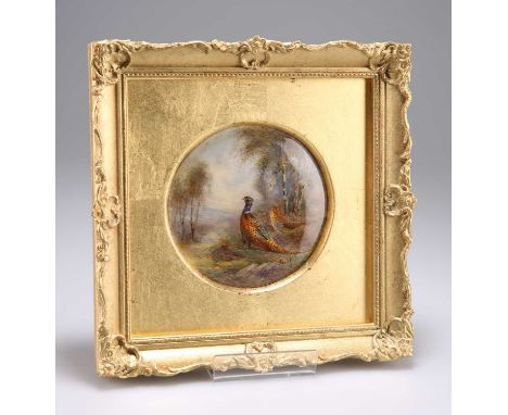 A ROYAL WORCESTER PLAQUE painted with a pheasant in a landscape by James Stinton, circular, in a gilt frame, puce printed fac