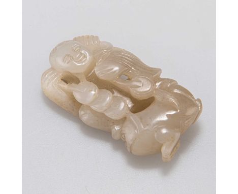 A CHINESE JADE GROUP OF LIU HAI AND THE THREE-LEGGED TOAD carved with the figure of Liu Hai standing on the back of the toad.