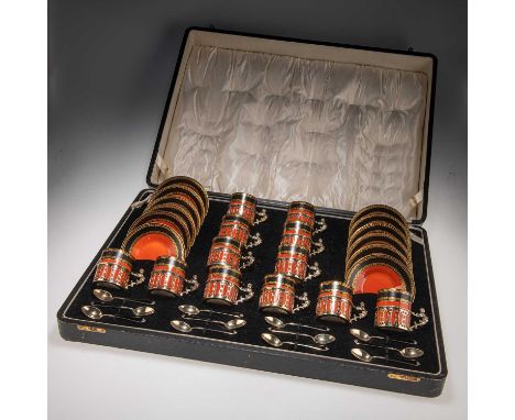 A CASED SET OF TWELVE ROYAL WORCESTER SILVER-GILT MOUNTED COFFEE CANS AND SAUCERS by Adie Brothers Ltd, Birmingham, eleven co