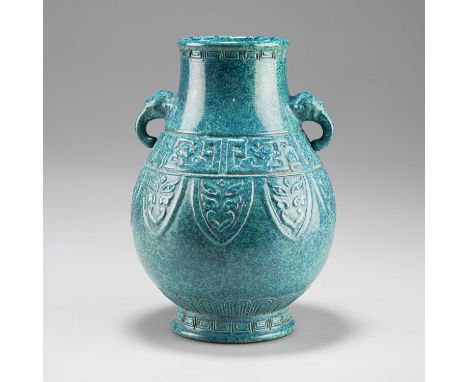 A CHINESE TWO-HANDLED VASE with a mottled turquoise glaze, bears an impressed seal mark. 19.5cm highIn good condition without