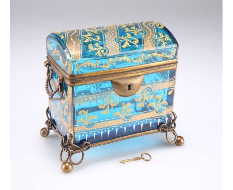 A LATE 19TH CENTURY BOHEMIAN GREEN GLASS CASKET of rounded rectangular form, with domed hinged cover, enamelled and gilded wi