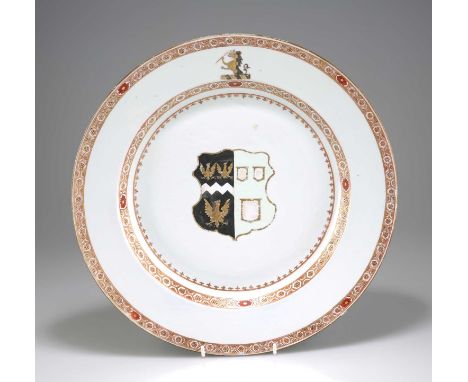 A CHINESE ARMORIAL PORCELAIN DISH, YONGZHENG, CIRCA 1730-35 with a bold armorial on a circular shape, with gilt and iron red 