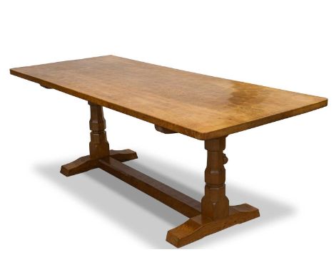 ROBERT THOMPSON OF KILBURN, A MOUSEMAN OAK 7-FOOT DINING TABLE, CIRCA 1960S the rectangular three-plank dowelled top raised o