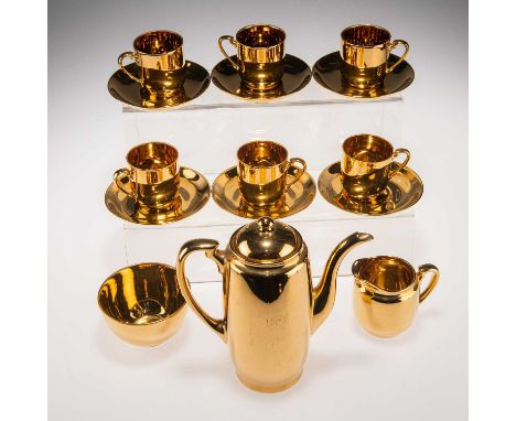 A JAPANESE NORITAKE PORCELAIN GILT COFFEE SET FOR SIX PERSONS comprising coffee pot, milk jug, sugar bowl and six coffee cans