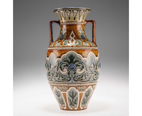 FRANK A. BUTLER FOR DOULTON LAMBETH, A LATE 19TH CENTURY LARGE STONEWARE AMPHORA VASE with angular scroll handles and a flare