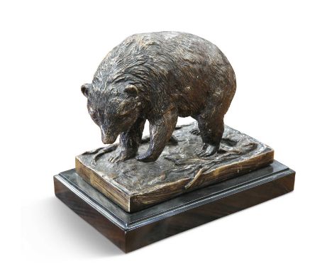 AFTER PRINCE, A BRONZE MODEL OF A BEAR standing on a naturalistic ground, signed in the cast, raised on a marble plinth. 29cm