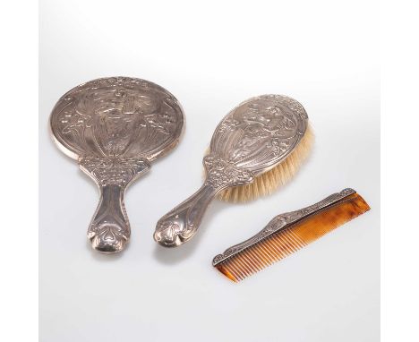 AN EDWARDIAN ART NOUVEAU SILVER-BACKED DRESSING TABLE SET by Cornelius Desormeaux Saunders &amp; James Francis Hollings (Fran