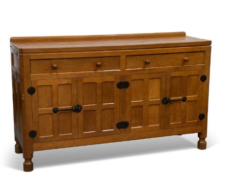 ROBERT THOMPSON OF KILBURN, A MOUSEMAN OAK SIDEBOARD, CIRCA 1960S with a pair of drawers over two pairs of four-panel doors, 