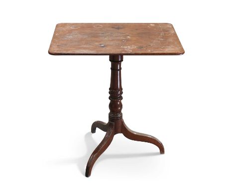 AN EARLY 19TH CENTURY MAHOGANY TILT-TOP TRIPOD TABLE the rectangular top with rounded corners, raised on a ring-turned balust