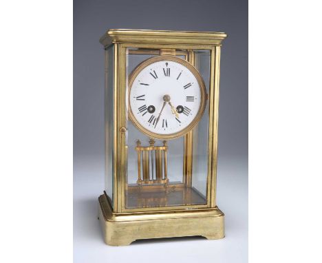 A BRASS-CASED FOUR-GLASS MANTEL CLOCK, CIRCA 1900 with two-train movement, the white enamel dial with Roman numerals. 26cm hi