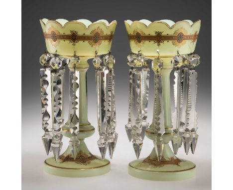 A PAIR OF MID-19TH CENTURY GLASS TABLE LUSTRES with gilt and enamel decoration and prism drops. (2) 34cm highOne of the lustr