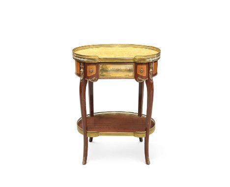 A CONTINENTAL GILT METAL-MOUNTED, MARBLE-TOPPED AND MAHOGANY TABLE AMBULANTE modern, the rounded marble top with pierced bras