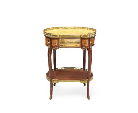 A CONTINENTAL GILT METAL-MOUNTED, MARBLE-TOPPED AND MAHOGANY TABLE AMBULANTE modern, the rounded marble top with pierced bras