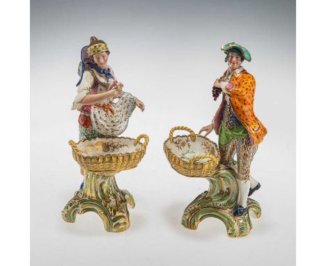 A PAIR OF MINTON SWEETMEAT FIGURES, CIRCA 1830-35 depicting the grape and flower gatherers, enamel and gilt decoration, unmar